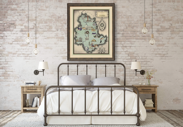 a bedroom with a large metal bed frame, a wooden nightstand on each side, and a framed map hanging on the wall above the bed.